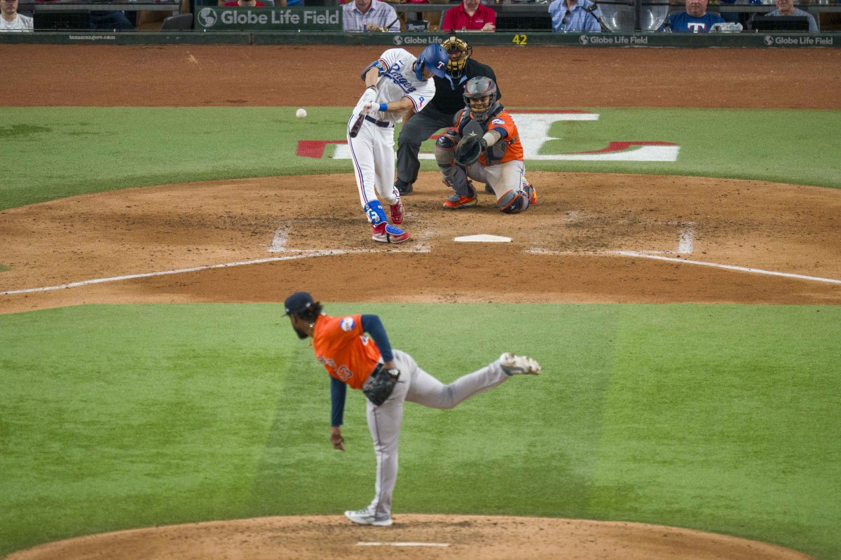 Oct 18, 2023; Arlington, Texas, USA; Texas Rangers left fielder Evan Carter (32) hits a double against Houston Astros starting pitcher Cristian Javier (53) during game three of the ALCS for the 2023 MLB playoffs at Globe Life Field. Mandatory Credit: Jerome Miron-USA TODAY Sports